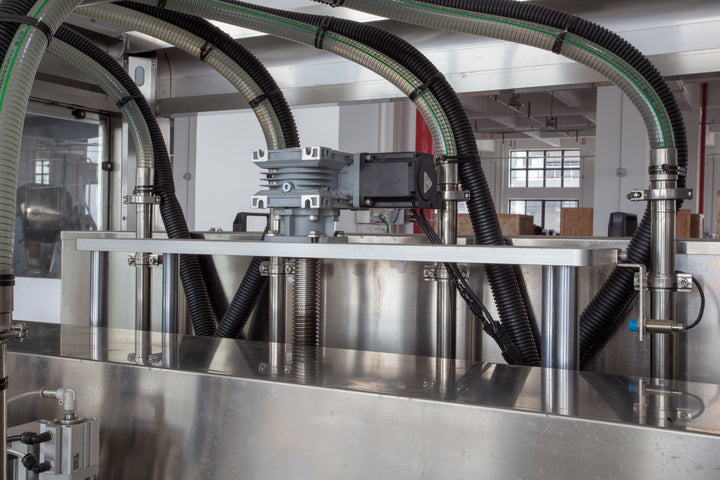 4-Head Mobile Liquid Filler - Side View | Tranfull