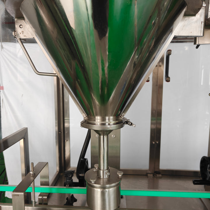 Auger powder filling machine discharge chute close-up - Tranfull