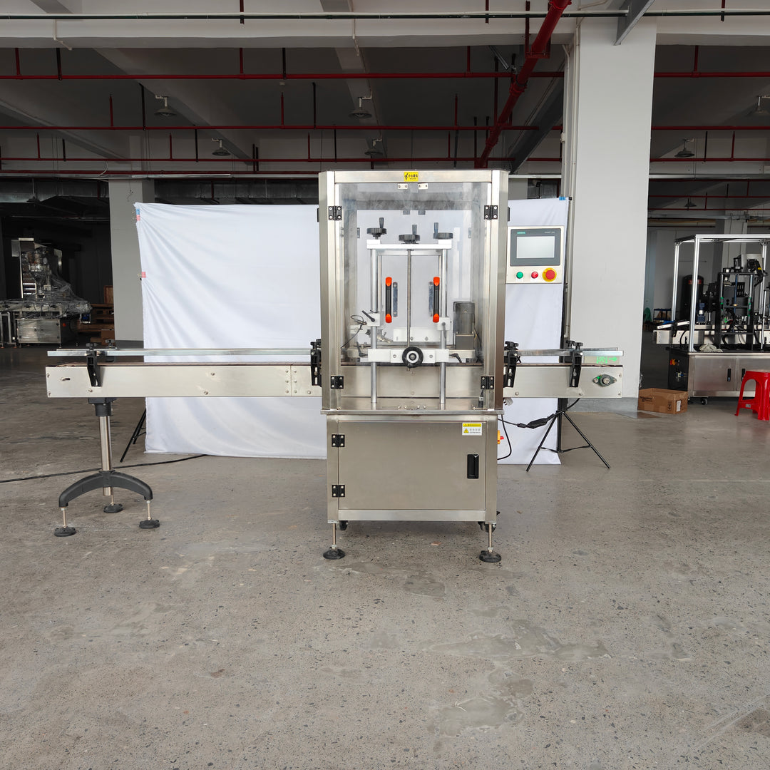 Automatic press-on capper bottle outlet and conveyor - Tranfull