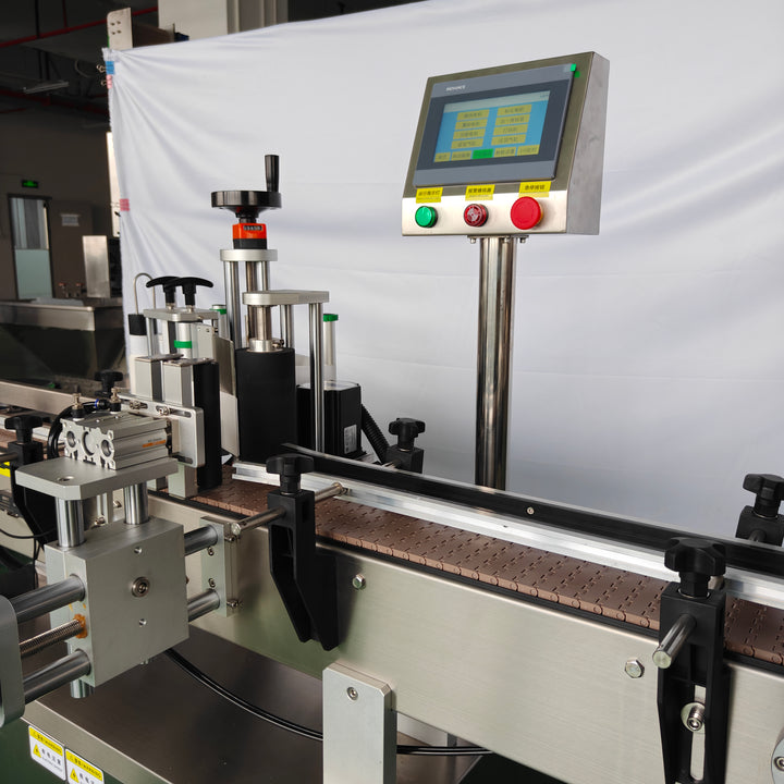 Clamping round bottle labeling machine label head detail - Tranfull