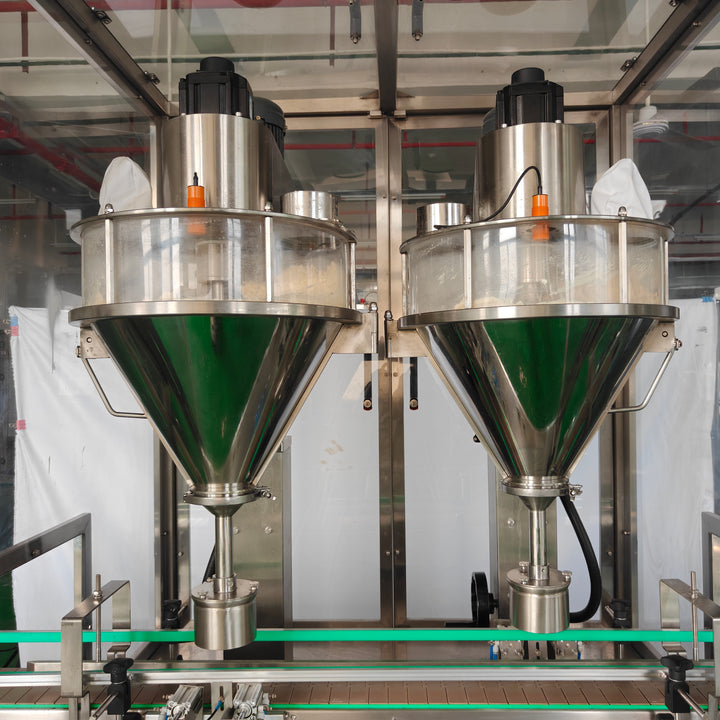 Dual auger filling heads and hopper close-up - Tranfull