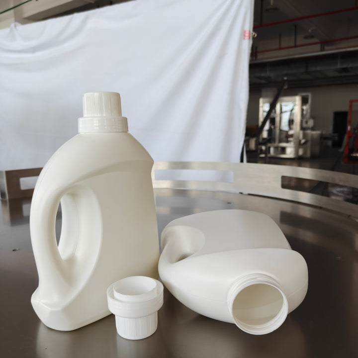 Laundry detergent filled bottles packaging result - Tranfull