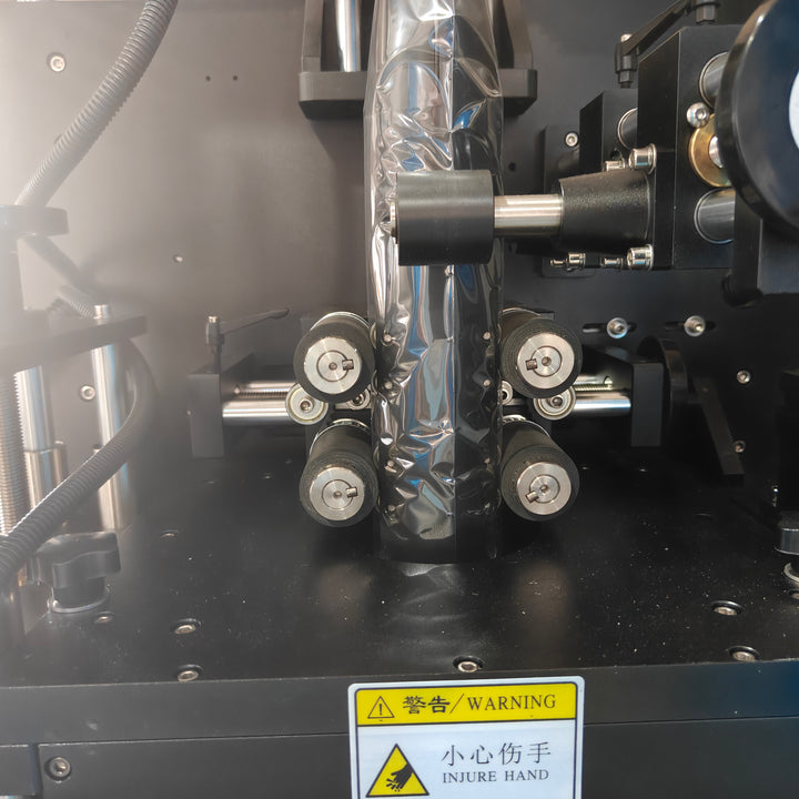Powder filling machine head close-up detail - Tranfull