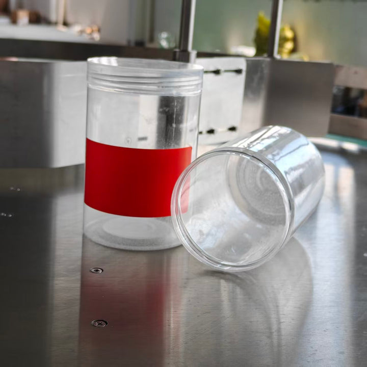 Round bottle labeling machine label application result - Tranfull