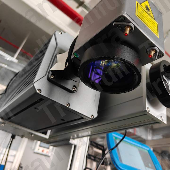 Online fiber laser date and batch coding machine - Tranfull