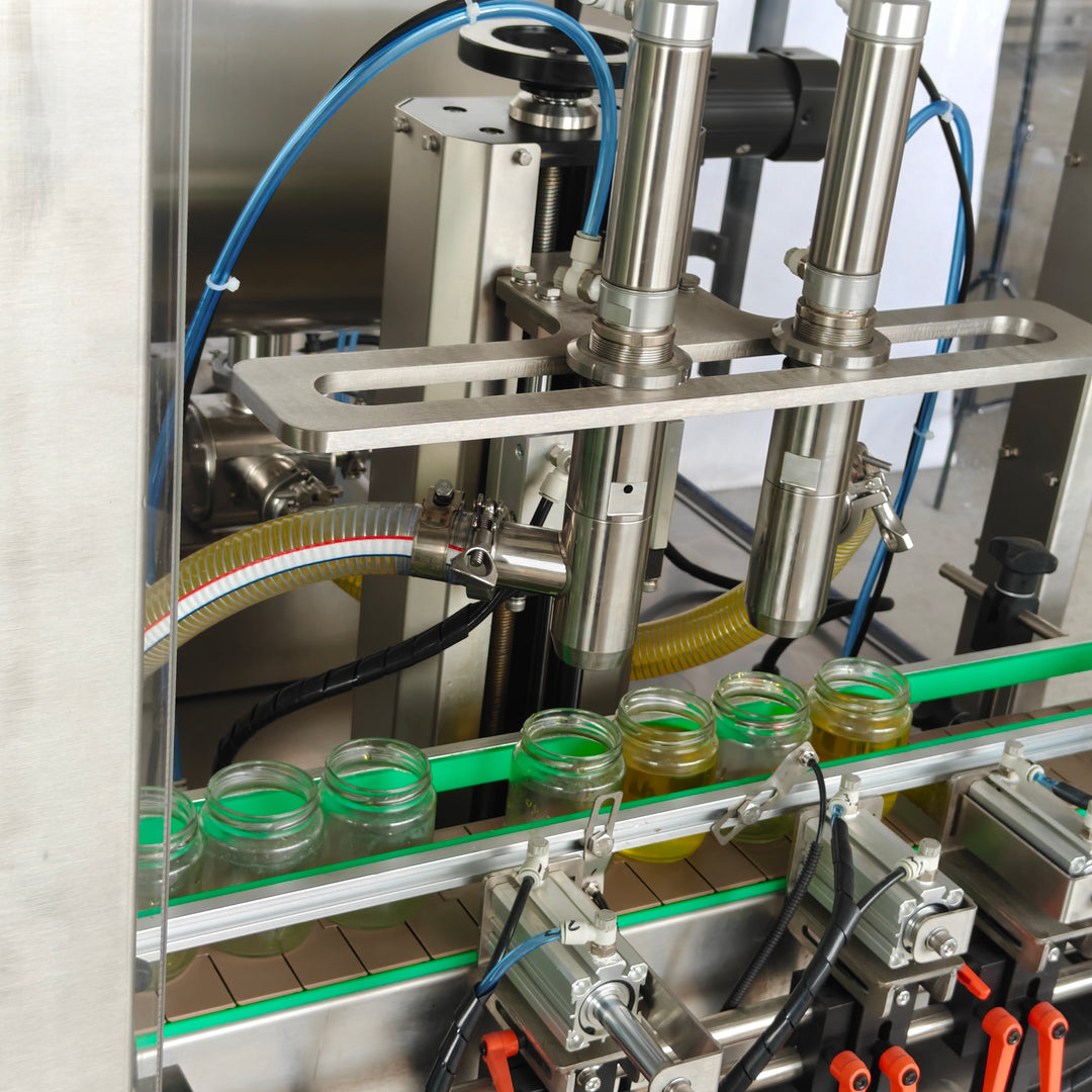 Piston filling machine nozzle close-up - precise viscous liquid filling - Tranfull