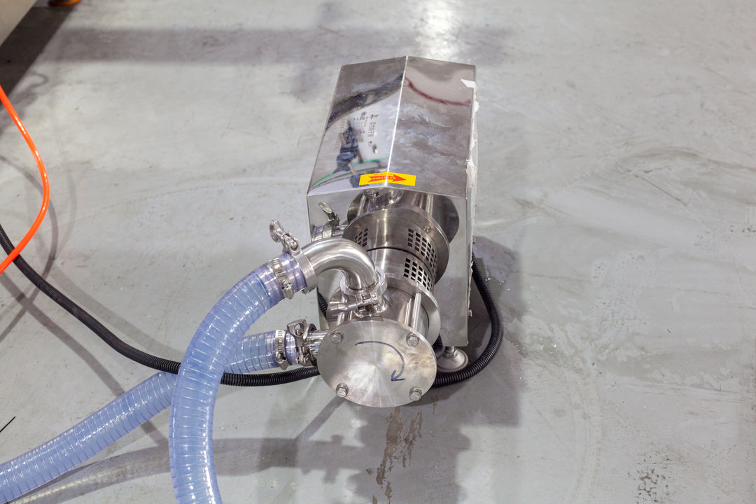 Piston Type Bottle Filling Machine - Side View | Tranfull