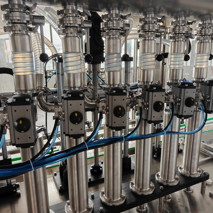 Servo Piston Liquid Filling Machine Production Line Side View - Tranfull